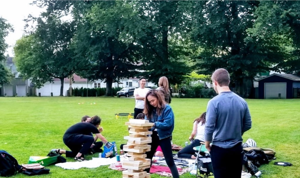 Blender employees play games at Trout Lake in the summer